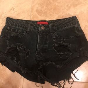 Black distressed shorts